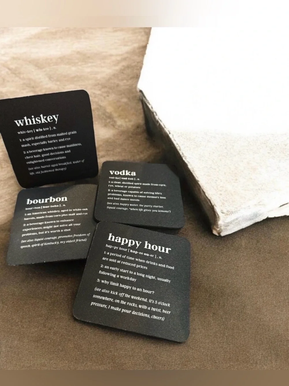 Set of Black Cocktail Coasters with White Text 1585